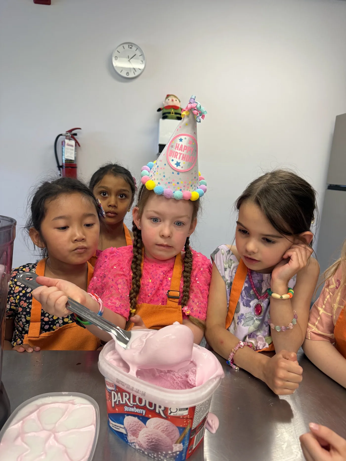 Kids celebrating a hands-on cooking birthday party at Cookiddoo in Kanata, Ottawa