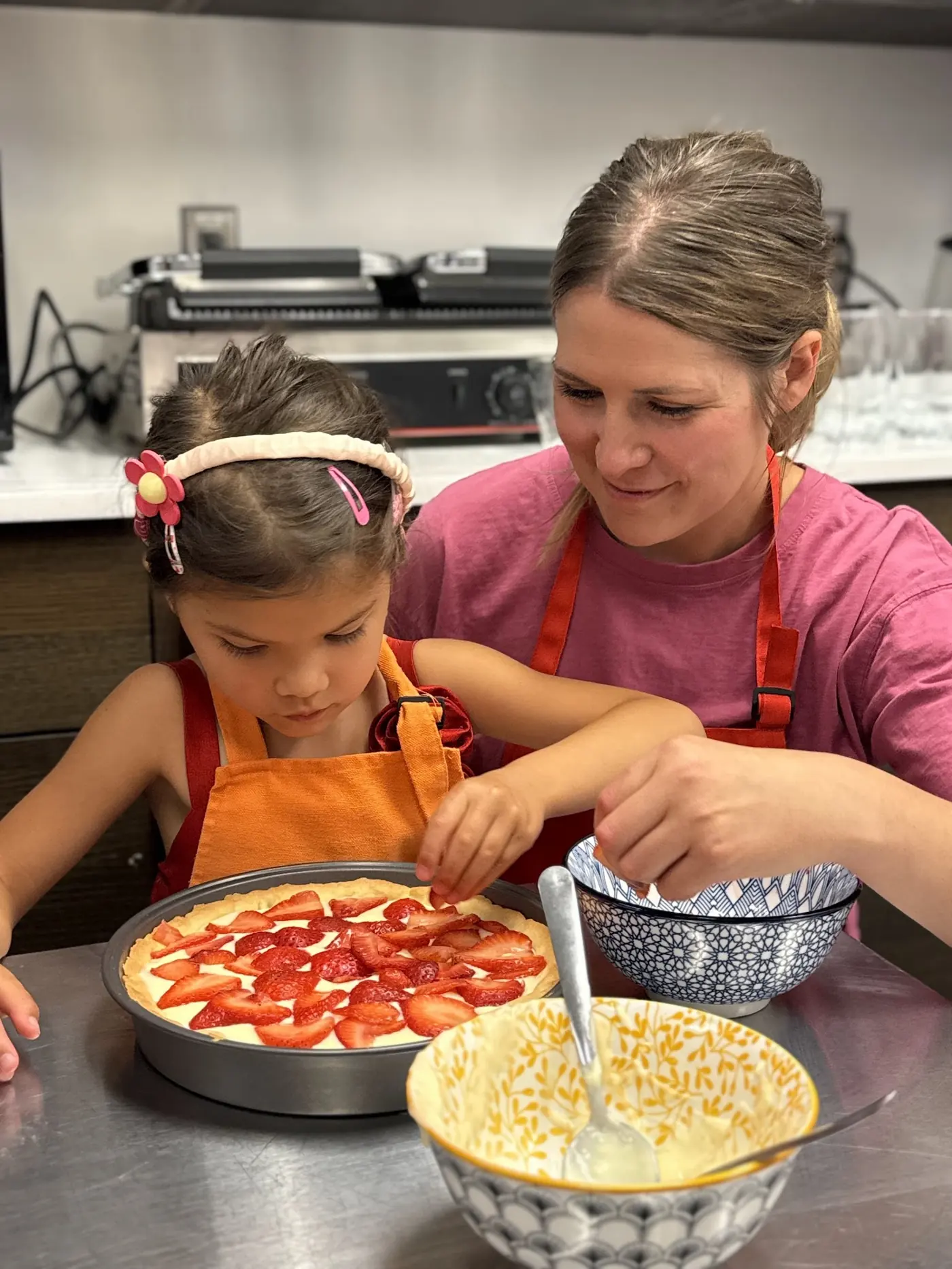 Kids developing skills while cooking at a Cookiddoo class in Ottawa