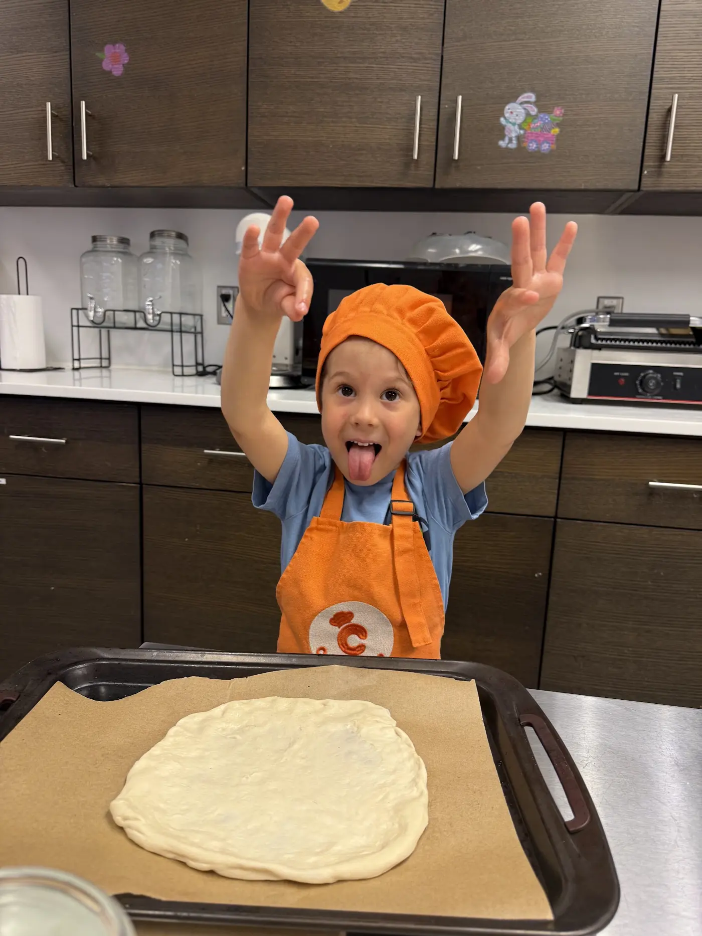 Kids enjoying March Break cooking activities at Cookiddoo studio in Ottawa
